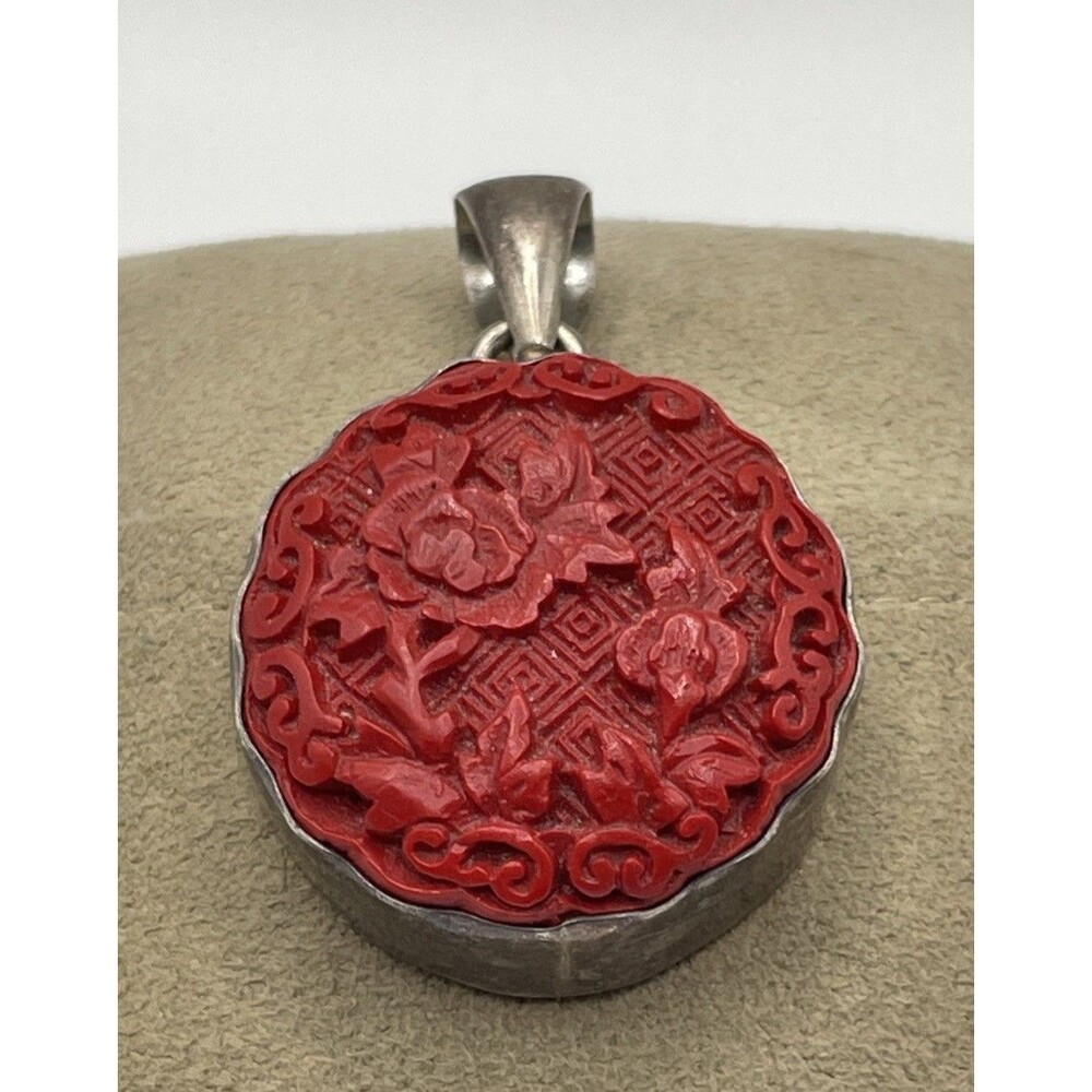 Large Charles Albert  Carved Floral Cinnabar Pendant Set In Fine Silver. NICE